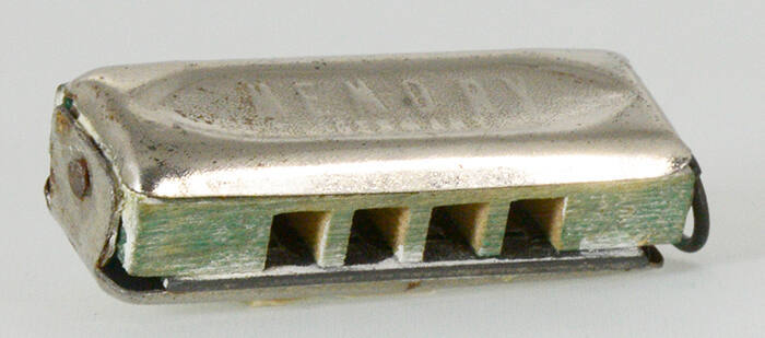 Miniature diatonic harmonica, A