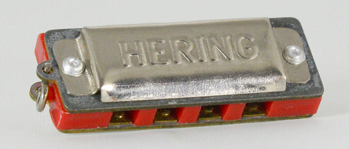 Miniature diatonic harmonica, A