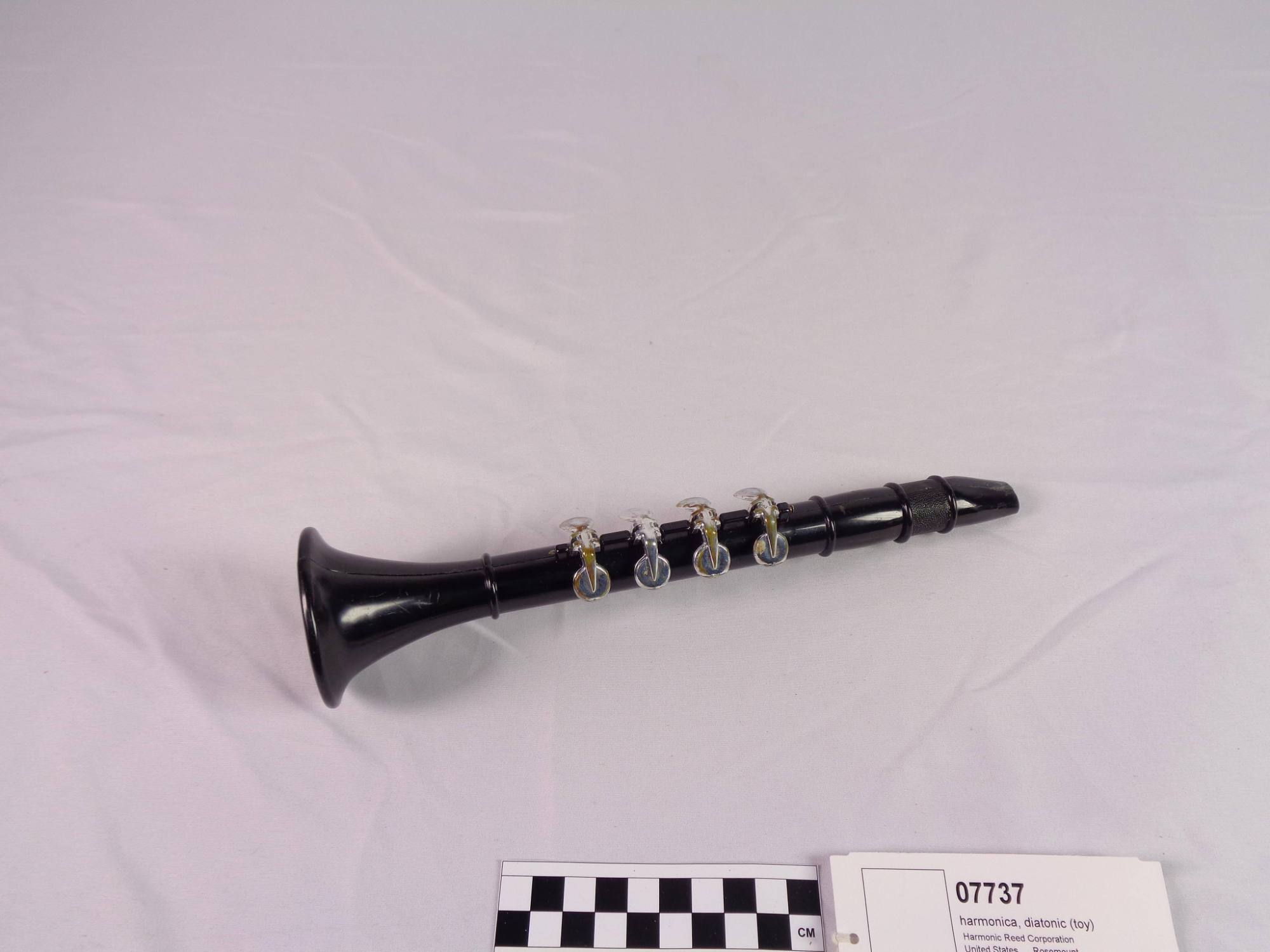 Diatonic harmonica, (toy)