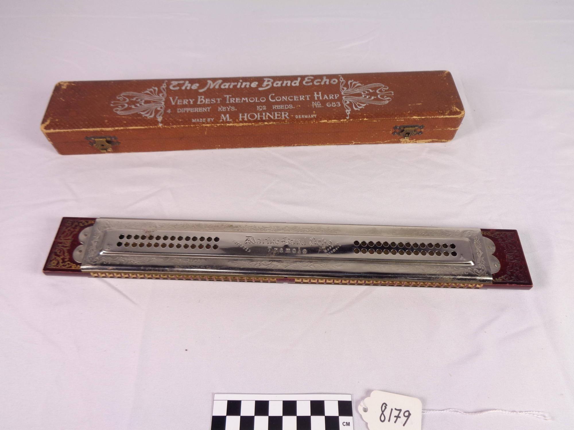 Double-sided, quartet tremolo harmonica, C, G, A, E