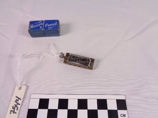 Miniature diatonic harmonica, A