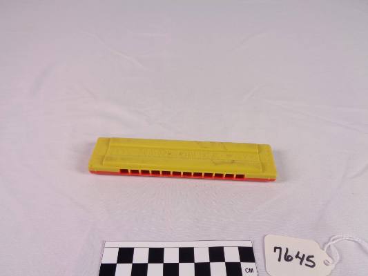 Double-sided harmonica, toy